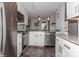 Bright kitchen featuring stainless steel appliances and granite countertops at 100 Willow Run Dr, Gastonia, NC 28056