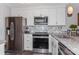 Modern kitchen showcasing stainless steel appliances and granite countertops at 100 Willow Run Dr, Gastonia, NC 28056
