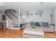 Spacious living room with a view of the staircase at 100 Willow Run Dr, Gastonia, NC 28056
