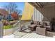 Relaxing outdoor porch with comfortable seating, perfect for enjoying the scenic surroundings at 100 Willow Run Dr, Gastonia, NC 28056