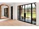 Bright foyer featuring sleek black framed windows and a light wood floor at 1004 Maxwell Ct # 1, Marvin, NC 28173