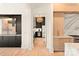 Open floor plan, kitchen pass through showing cabinetry, appliances and wine fridge at 1004 Maxwell Ct # 1, Marvin, NC 28173