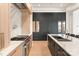 Modern kitchen featuring a large island, marble countertops, and stainless steel appliances at 1004 Maxwell Ct # 1, Marvin, NC 28173
