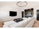 Modern living room with a sleek wet bar and stylish lighting, perfect for entertaining at 1004 Maxwell Ct # 1, Marvin, NC 28173