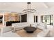 Airy living room featuring recessed lights, open floorplan, and a modern chandelier at 1004 Maxwell Ct # 1, Marvin, NC 28173