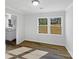 Dining room features hardwood floors, fresh paint, and views of the backyard at 1188 Parkmont Ln, Rock Hill, SC 29730