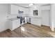 Modern kitchen with white cabinets, stainless steel appliances, and hardwood flooring at 1188 Parkmont Ln, Rock Hill, SC 29730