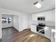 Bright kitchen with stainless steel appliances, new cabinets, and adjoining dining area at 1188 Parkmont Ln, Rock Hill, SC 29730