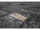 Aerial view of property with approximated lot lines showcasing home and surrounding landscape in black and white at 120 Dixie Dr, Shelby, NC 28021