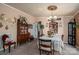 Traditional dining room featuring a chandelier, china cabinet and seating for six at 120 Dixie Dr, Shelby, NC 28021