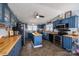 Spacious kitchen featuring a central island, stainless steel appliances, and ample cabinet space at 120 Dixie Dr, Shelby, NC 28021