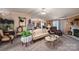 Cozy living room featuring a fireplace, neutral color palette, and comfortable seating at 120 Dixie Dr, Shelby, NC 28021