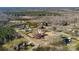 Expansive aerial view of a private property featuring a traditional home, mature trees, and lush landscaping at 133 Persimmon Creek Rd # 81, Kings Mountain, NC 28086