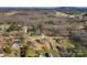 Expansive aerial view of a private property featuring a traditional home, mature trees, and lush landscaping at 133 Persimmon Creek Rd # 81, Kings Mountain, NC 28086