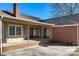 Back patio with a brick surround and a covered porch at 133 Persimmon Creek Rd # 81, Kings Mountain, NC 28086