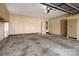 Spacious garage with storage cabinets and a door to the outside at 133 Persimmon Creek Rd # 81, Kings Mountain, NC 28086