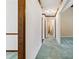 Hallway with view of doors and light-blue carpet at 133 Persimmon Creek Rd # 81, Kings Mountain, NC 28086