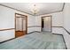 Spacious living room with classic molding and light-blue carpet at 133 Persimmon Creek Rd # 81, Kings Mountain, NC 28086