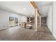 Spacious finished basement with wood-look floors provides plenty of space for entertaining at 13701 Petworth Ct, Charlotte, NC 28278