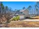 Beautiful home exterior featuring a two-car garage, well-manicured yard, and inviting curb appeal at 13701 Petworth Ct, Charlotte, NC 28278