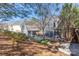 Exterior view of a charming backyard with a shed and an outdoor living space at 13725 Mallory Baches Ln, Huntersville, NC 28078