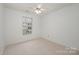 Bedroom featuring light-colored carpet and a window at 1452 Deer Forest Dr, Indian Land, SC 29707