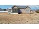 Backyard view of home with screened-in porch, patio, and spacious yard at 1529 Alex Dr, Shelby, NC 28152