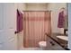 Bathroom showcases a vanity with modern hardware, a toilet, and a shower curtain at 1529 Alex Dr, Shelby, NC 28152
