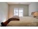 Bedroom featuring hardwood floors and a window with natural light at 1529 Alex Dr, Shelby, NC 28152