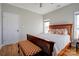 Cozy bedroom with hardwood floors, and a decorative bench at the end of the bed at 1529 Alex Dr, Shelby, NC 28152