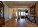 Spacious living room with hardwood floors, fireplace, large windows, and open layout at 1529 Alex Dr, Shelby, NC 28152
