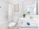 Clean bathroom with a shower-tub combo and a single sink vanity with a white cabinet at 219 Tillery Ln # 754P, Mount Gilead, NC 27306