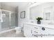 Bright bathroom with a glass-enclosed shower and double sink vanity at 219 Tillery Ln # 754P, Mount Gilead, NC 27306