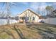 Charming backyard featuring a small deck and fenced yard, perfect for outdoor enjoyment at 293 Blanche Cir, Rock Hill, SC 29730