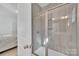 Modern bathroom with a tiled shower and glass door, showcasing a clean and stylish design at 293 Blanche Cir, Rock Hill, SC 29730