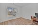 Simple bedroom with a computer desk by the window, showcasing functionality and natural light at 293 Blanche Cir, Rock Hill, SC 29730