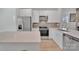 Beautiful kitchen featuring stainless steel appliances, white cabinets, and counter seating at 293 Blanche Cir, Rock Hill, SC 29730