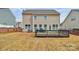 Well-maintained backyard featuring a wooden deck, ideal for relaxation and outdoor gatherings at 4118 Caldwell Ridge Pkwy, Charlotte, NC 28213