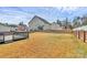 Spacious backyard with wooden fence and deck, perfect for outdoor activities and entertaining at 4118 Caldwell Ridge Pkwy, Charlotte, NC 28213