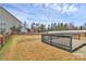 Large backyard with a wooden deck and privacy fence, offering a serene outdoor space at 4118 Caldwell Ridge Pkwy, Charlotte, NC 28213