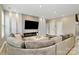 Spacious living room with large sectional sofa, fireplace, and recessed lighting at 4118 Caldwell Ridge Pkwy, Charlotte, NC 28213