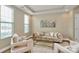 Bright and airy living room with plush seating and modern decor at 4118 Caldwell Ridge Pkwy, Charlotte, NC 28213