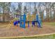 Community playground featuring colorful play structures and a soft landing surface for children at 4118 Caldwell Ridge Pkwy, Charlotte, NC 28213