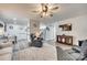 Open concept living room showcasing hardwood floors, a ceiling fan, and an open layout at 455 Roberts Ave, York, SC 29745