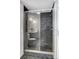 Sleek bathroom showcasing glass shower with black marble wall and floors at 5010 Arbordale Way # 5, Mount Holly, NC 28120
