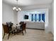 Open-concept dining area flows into the living room, creating a spacious and inviting atmosphere at 5010 Arbordale Way # 5, Mount Holly, NC 28120