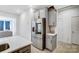 Modern kitchen with stainless steel refrigerator and light gray cabinets offering ample storage space at 5010 Arbordale Way # 5, Mount Holly, NC 28120