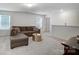 Inviting upstairs living room with neutral carpet, large sectional sofa, and abundant natural light at 5010 Arbordale Way # 5, Mount Holly, NC 28120