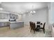 Spacious living area connected to the kitchen and dining, ideal for modern living and entertaining at 5010 Arbordale Way # 5, Mount Holly, NC 28120
