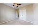 A cozy bedroom with carpeted floors and a closet at 6452 Silver Star Ln, Charlotte, NC 28210